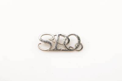 Insigne métallique d'épaule, 1938-1960